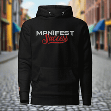 Load image into Gallery viewer, Black unisex hoodie featuring "Manifest Success" design, perfect for comfort and style in achieving goals.