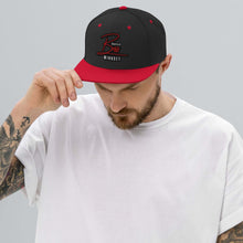 Load image into Gallery viewer, Black and red Gorilla Boss Mindset snapback hat worn by a man with tattoos, showcasing a stylish and bold look.