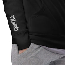 Load image into Gallery viewer, Close-up of the Gorilla Boss Mindset Pullover Hoodie in black, showcasing the embroidered logo on the sleeve.
